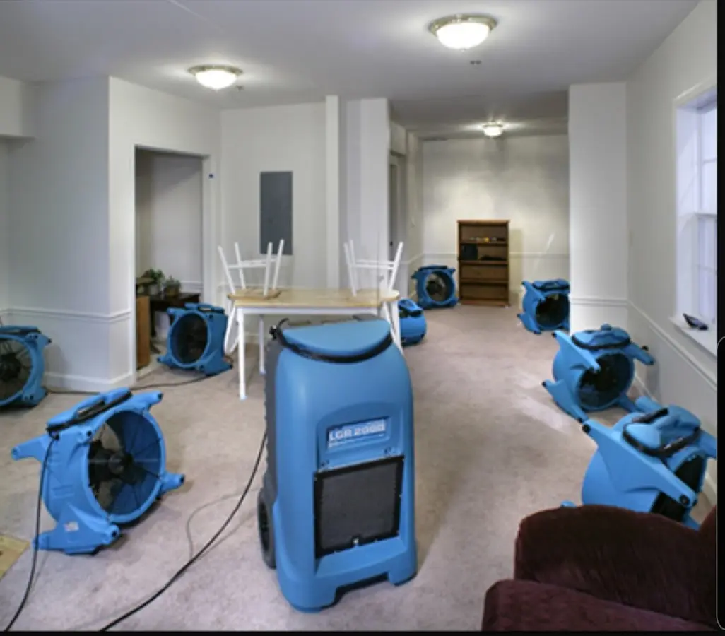 Air movers and dehumidifier setup for Water Extraction & Removal in Fowler